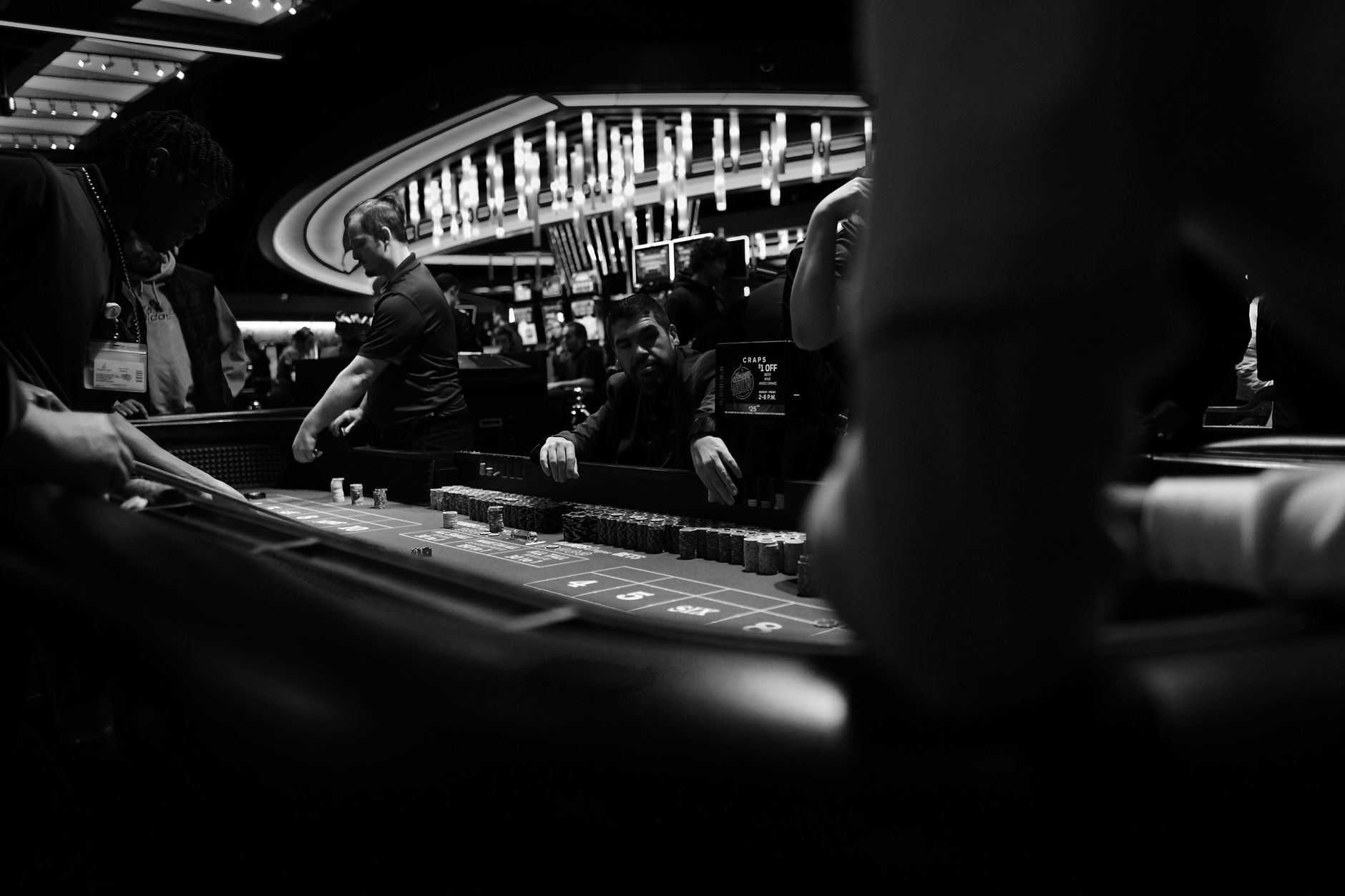 black and white casino craps table scene