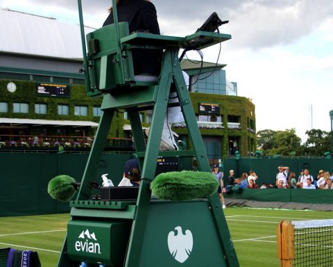 umpire by tennis court