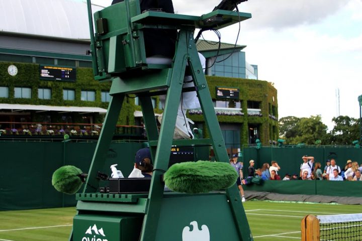 umpire by tennis court